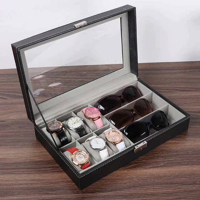 Watch Organizer in Best Quality Material. Note: Watches and jewelry are not included  Material: Faux Leather Color: Black Variation:  6 grid Watch and 3 sunglasses) Feature:  Perfect gift for any Watch, Sunglasses & Jewellery enthusiast  Perfect for displaying your watches, Sunglasses or jewelry whatever in a shop or on your dressing table.  Perfect gift for groomsmen, best men, father of the bride, birthdays, graduations, father's day or any other occasio