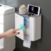Space-saving wall-mounted toilet paper and towel organizer