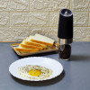Gravity Operated automated Salt and Pepper Grinder.