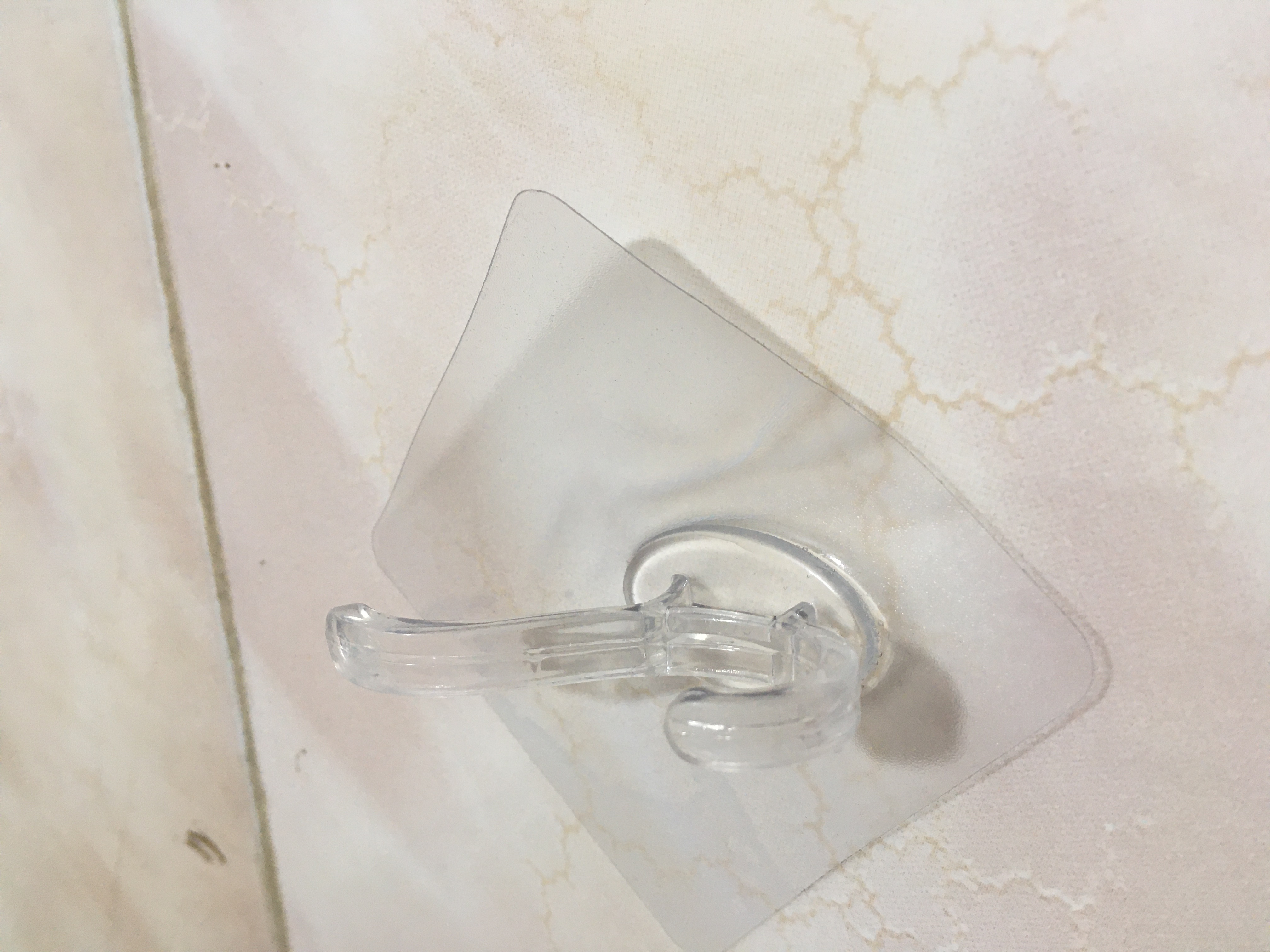 "Adhesive hanger sticker"